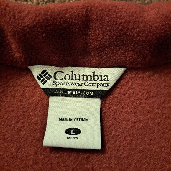 Columbia fleece vest in a burnt orange or rust color. - Picture 7 of 7